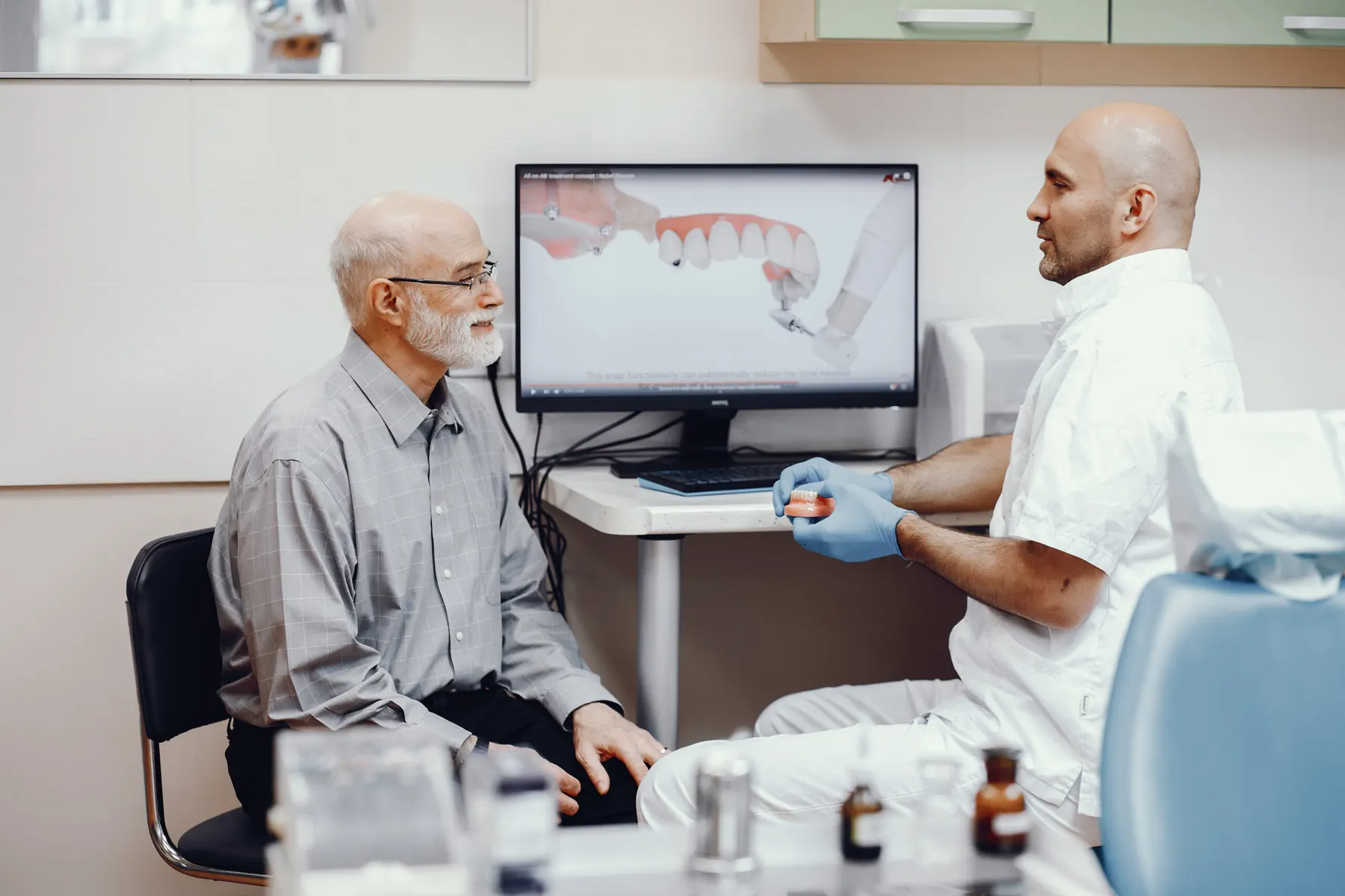 A relaxed patient in the treatment chair at ImplantWIDE