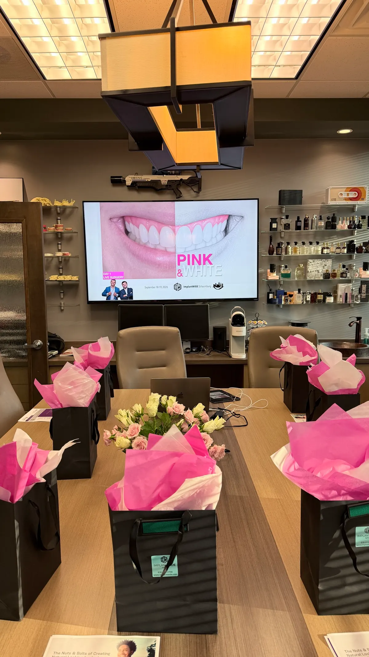 Course room with Pink and White FP1 branding on the display